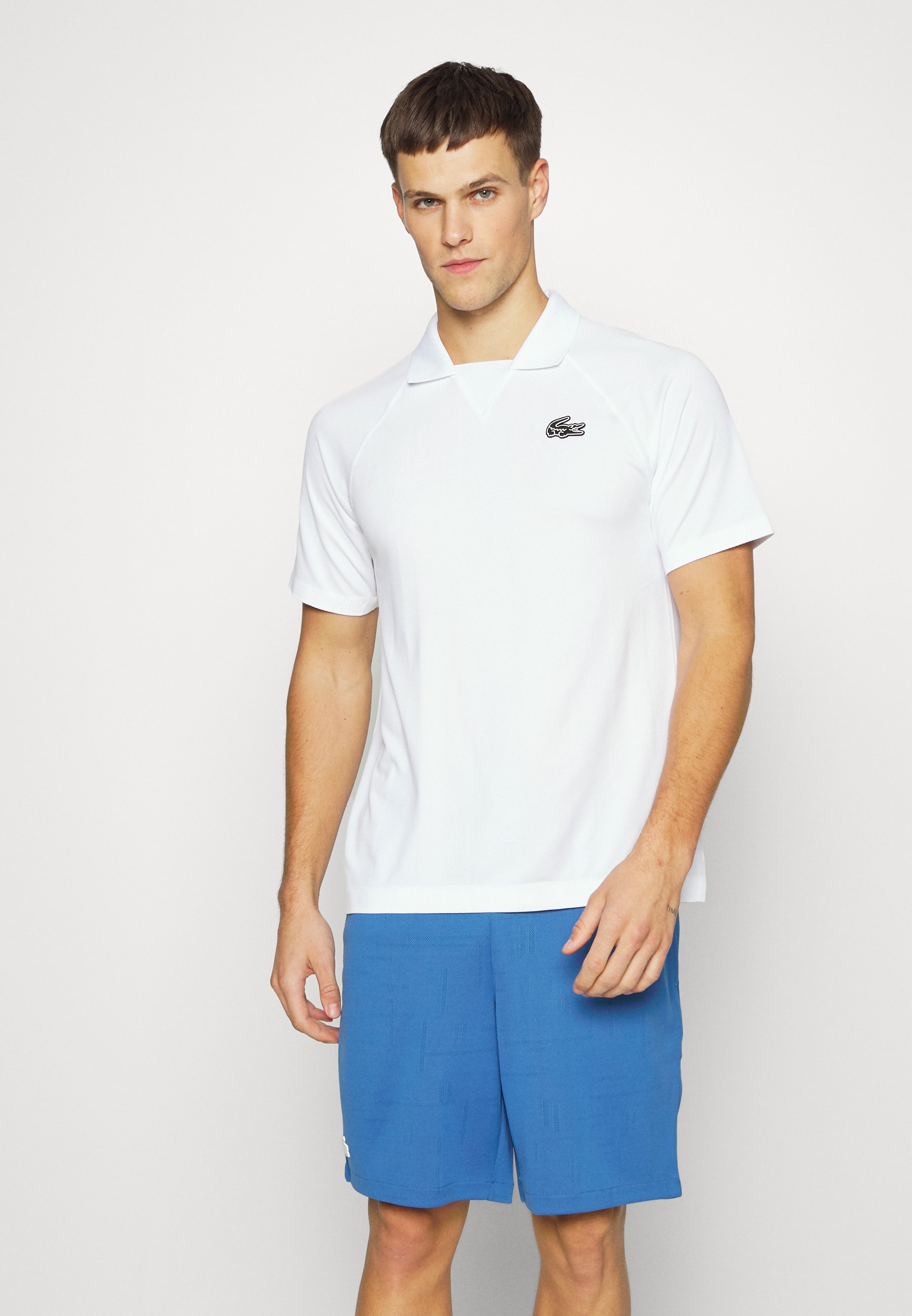 Magliette Lacoste | T-shirt da tennis fluida con maniche con scritta Lacoste  SPORT Turchese/Blu Navy/Bianco/Blu Navy Donna – MuseuminMotion