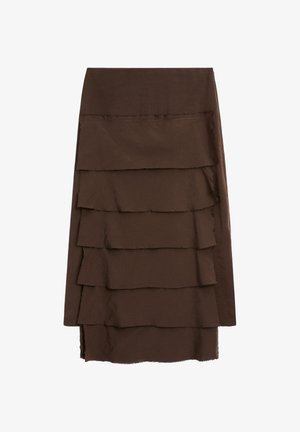 Brown layered skirt with five horizontal ruffles. Made of soft fabric with a smooth texture. Hemline is uneven and raw.
