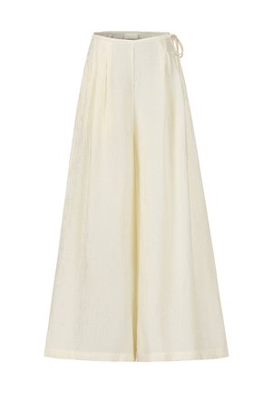 Pantalons larges en jaune clair, fabriqués en tissu froissé. Présente une taille à cordon de serrage et des détails plissés pour une texture ajoutée.