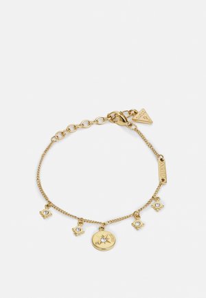 Delicate gold chain bracelet with star and round charms, each adorned with small clear crystals and engraved details.