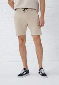 Pier One - Tracksuit bottoms - tan Thumbnail Image 1