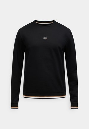 Juodas medvilninis džemperis su apvalia iškirpte, ilgomis rankovėmis ir ribinėmis rankogaliais. Išskirtinis BOSS logotipas ir dryžuoti akcentai apačioje.