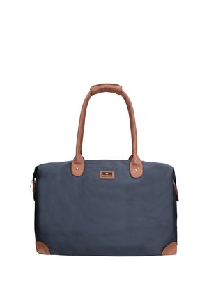 Sac de voyage bleu marine avec des poignées en cuir marron, des renforts d'angle et un petit patch rectangulaire de marque au centre.