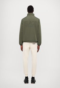 EA7 Emporio Armani GIUBBOTTO UNISEX - Lahka jakna - beetle