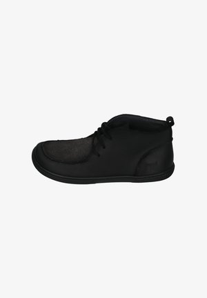 Black ankle shoes with a smooth leather upper and a textured fabric panel. Features laces and a low-profile rubber sole.