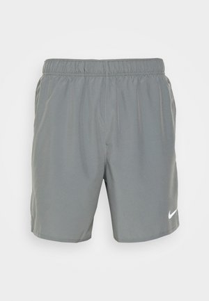 Gray athletic shorts with an elastic waistband. Made from lightweight fabric, featuring a small white Nike logo on the lower left leg.