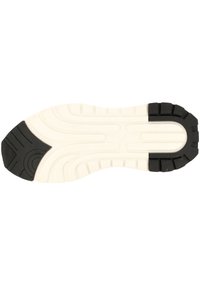 Semelle de chaussure avec des accents de talon et d'orteils en caoutchouc noir. La semelle intermédiaire blanche présente une surface texturée et un motif de semelle pour une meilleure adhérence et traction.