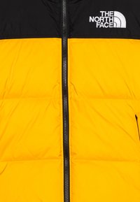 The North Face TEEN RETRO NUPTSE UNISEX - Jakna ispunjena paperjem - summit gold