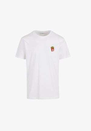 Valge puuvillane T-särk, millel on vasakul rinnaosal väike tikand punastest friikartulitest. Standardne ümmargune kaelus.