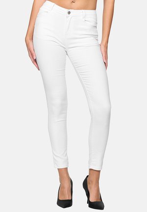 - Jeansy Skinny Fit