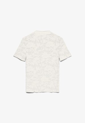 Hvit kortermet skjorte med subtilt blomsteranimasjon, vist flat med baksiden opp.