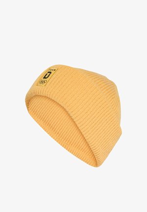 Żółta prążkowana dzianinowa czapka z odwiniętym mankietem i małą naszywką z napisem „Team”, stylizowaną literą „D” oraz symbolami olimpijskimi.