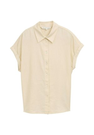 Šviesiai bežinė, trumpomis rankovėmis ir mygtukais užsegama marškiniai. Yra klasikinė apykaklė, minkšta tekstūra ir atsipalaidavęs siluetas. Mygtukai yra balti. Paprastas dizainas.