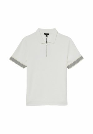 Valkoinen lyhythihainen poolopaita, jossa on vetoketju edessä, kaulus ja mustavalkoraidalliset hihansuut.