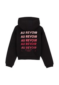 Črna skrajšana hoodie s poudarjeno rožnato napisom "AU REVOIR" večkrat in "paris paris paris vsak dan" na dnu. Napis variira v velikosti in slogu.