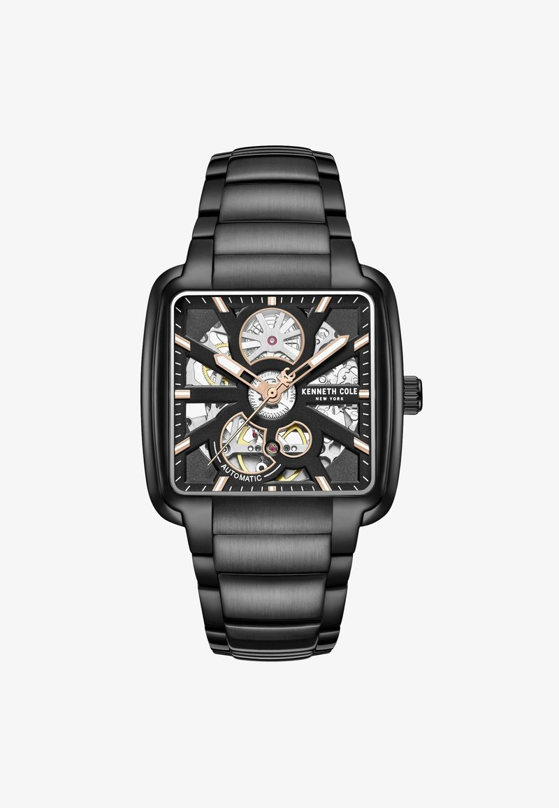 Orologio automatico Kenneth Cole con cassa quadrata nera, quadrante nero e oro, sezioni trasparenti e bracciale in metallo coordinato.