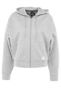 Šedá mikina na zip vyrobená z měkké látky, s kapucí, předními kapsami a nenápadným logem Adidas v dolním levém rohu.