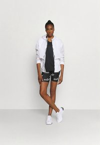 Puma PERFORMANCE TANK  - Débardeur - black