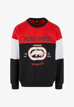 Czarna, czerwona i biała bluza z długimi rękawami. Posiada okrągły dekolt, wyraźny nadruk logo oraz grafikę nosorożca na środku.