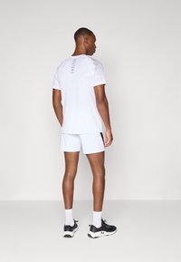Endless SHORT STORM - Sports shorts - white/black
