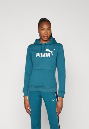 Turkusowa bluza z kapturem z kieszenią kangurzą, z dużym białym logo "PUMA" i emblematem kota PUMA. Żeberkowe mankiety i dół.