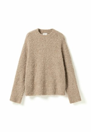 Beige, blød strikket sweater med lange ærmer og rund hals, lagt fladt på en hvid baggrund.