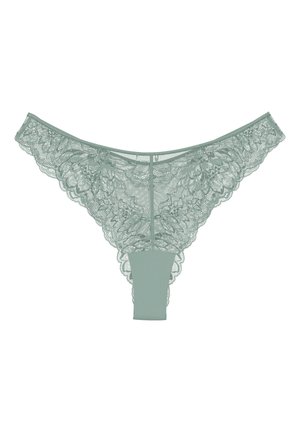 Spitzenstring in sanftem Mintgrün mit kompliziertem Blumenmuster, transparenter Vorderseite und solidem Rückenteil. Die gewellten Kanten verleihen Textur und Detail.
