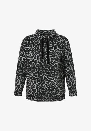 Pull-over à imprimé léopard noir et gris avec une coupe décontractée, un col et deux cordons noirs au niveau du cou. Fabriqué en tissu doux.