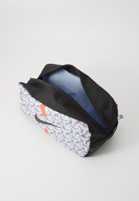 Rectangular bag with a patterned light blue and white exterior, black zipper, and a solid black bottom. Interior features a light blue lining.