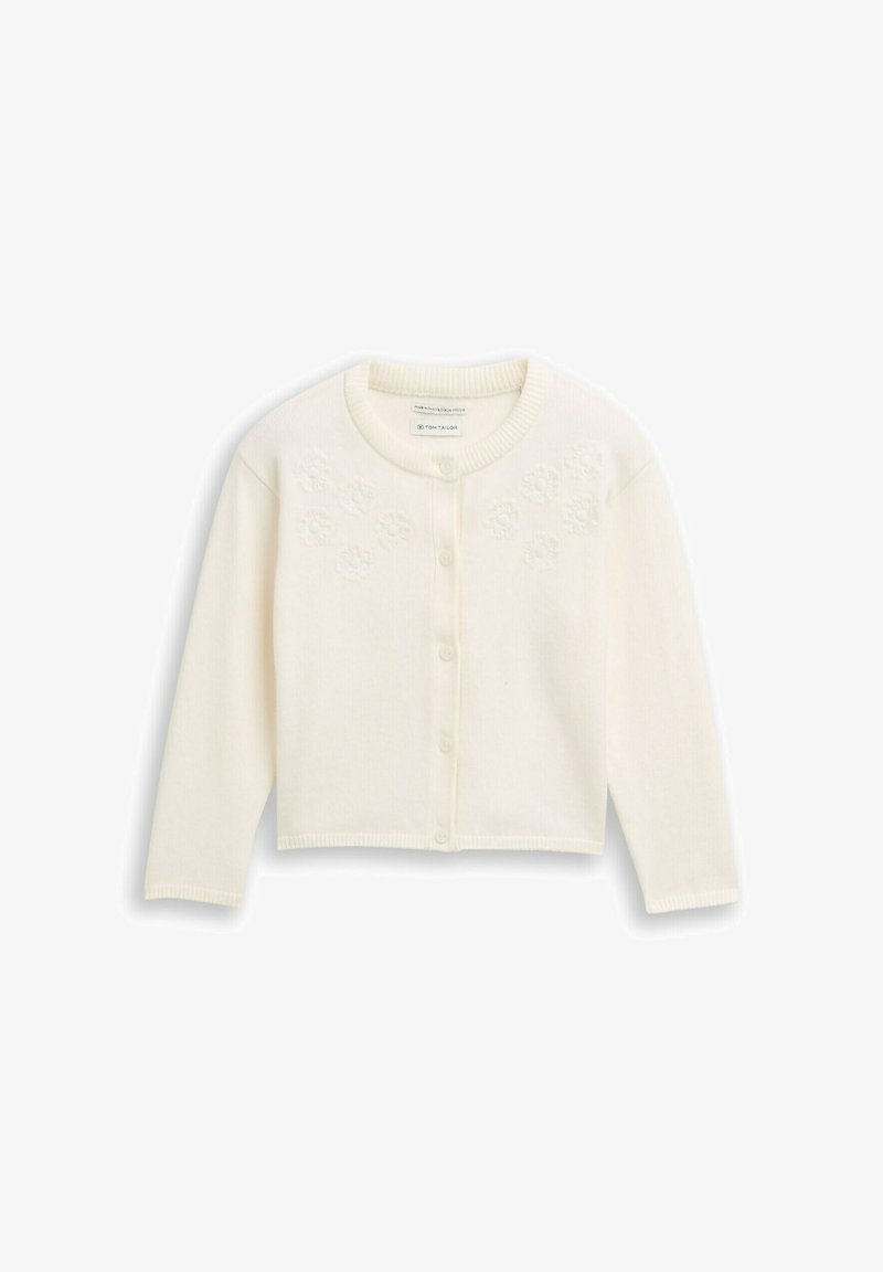 Weißer, gerippter Strickcardigan mit langen Ärmeln, Rundhalsausschnitt und sieben vorderen Knöpfen. Verziert mit gestickten floralen Akzenten auf der Brust.