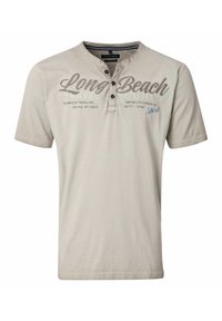 Jasno beżowa koszulka z krótkim rękawem wykonana z bawełny. Posiada trzy guzikową listwę i nadrukowany tekst, w tym "Long Beach" w ciemnym brązie.