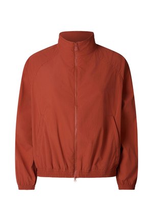 Leichte Jacke in Rostfarbe mit durchgehendem Reißverschluss, hohem Kragen, elastischen Bündchen und Saum.
