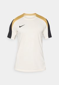 STRIKE TOP - Bluză sport - pale ivory/black/jersey gold
