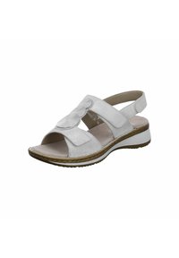 White sandal with open toe, featuring a velcro strap and embossed design. Smooth synthetic upper, cushioned sole, and textured outsole for grip.