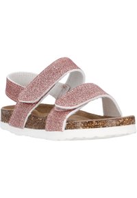 Sandali rosa con glitter, dotati di due cinturini regolabili, suola in sughero e suola in gomma bianca. Texture liscia e design casual per un comfort ottimale.