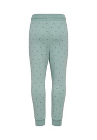 Mintgroene leggings met een zachte textuur, voorzien van een herhaald klein zwart patroon. Fitted enkelmanchetten en een elastische tailleband.