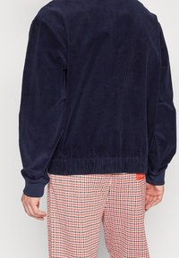 Sergio Tacchini Lehká bunda - blue