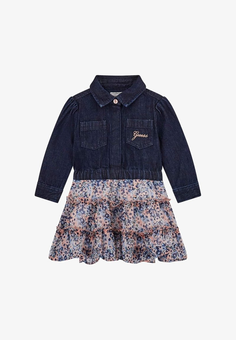 Tamno plavi traper haljina s dugim rukavima, kragnom na dugme, dva džepa na prsima i laganim cvjetnim volanom na rubu.