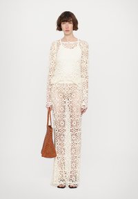 Norma Kamali Bluză cu mânecă lungă - cream