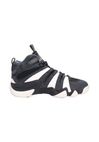 Hochschuh-Sporttrainer in Schwarz und Weiß, ausgestattet mit einem Obermaterial aus Wildleder und Mesh, Gummisohle und einem einzigartigen Overlay-Design mit auffälligen Schnürsenkeln.
