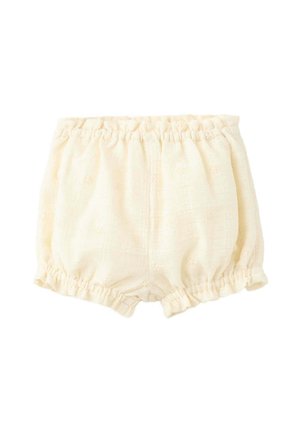 Crèmekleurige babybloomers met elastische tailleband en beenopeningen, met subtiele geborduurde bloemmotieven.