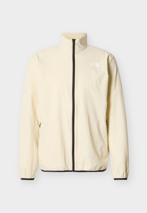 Beige Jacke mit durchgehendem Reißverschluss, hohem Kragen, elastischen Bündchen und Saum, Seitentaschen und einem kleinen weißen Logo auf der linken Brust.
