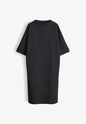 Schwarzes Kleid in Übergröße mit rundem Ausschnitt, kurzen Ärmeln und glatter Textur, mit geradem Schnitt und minimalistischem Design.