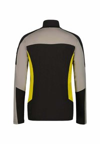 Musta, harmaa ja keltainen takki, jossa on korkea kaulus, pitkät hihat ja värilohkoinen muotoilu. Sileä pinta, jossa on kontrastivärejä.