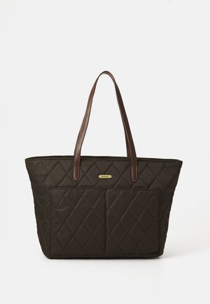 Quilted dark brown tote bag with two large front pockets, leather handles, and small gold brand label at top center.