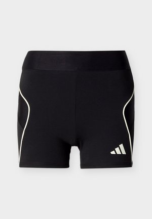 Shorts de sport noirs avec une large ceinture, un liseré blanc sur les côtés et un petit logo Adidas blanc sur la jambe avant droite.