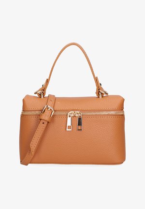 Sac à main en cuir tanné avec poignée supérieure, bandoulière ajustable et fermeture éclair dorée avec double curseur.