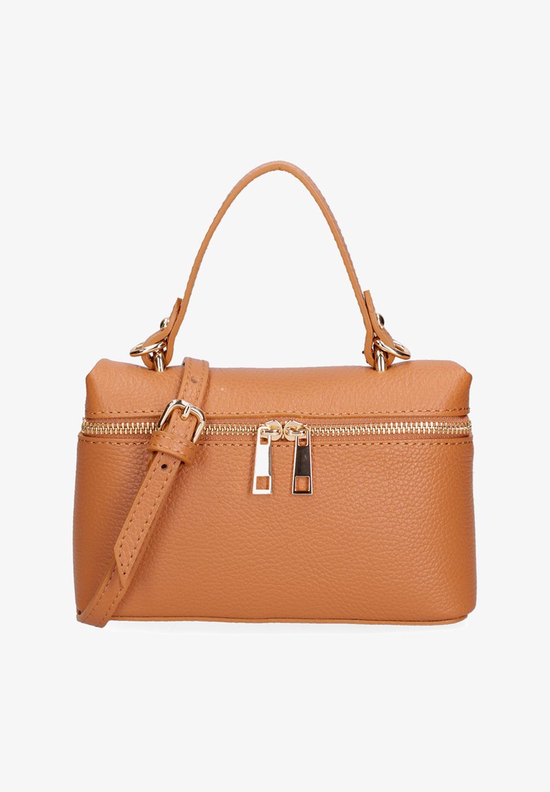 Sac à main en cuir tanné avec poignée supérieure, bandoulière ajustable et fermeture éclair dorée avec double curseur.