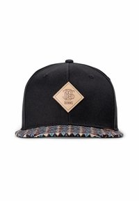 Black cap with a flat brim, featuring a patterned multi-colored underside and a diamond-shaped leather logo patch on the front.