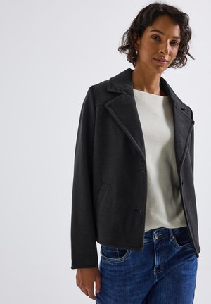 Dark gray wool-blend jacket with a notched lapel, front pockets, and a cropped design, worn over a light cream sweater.